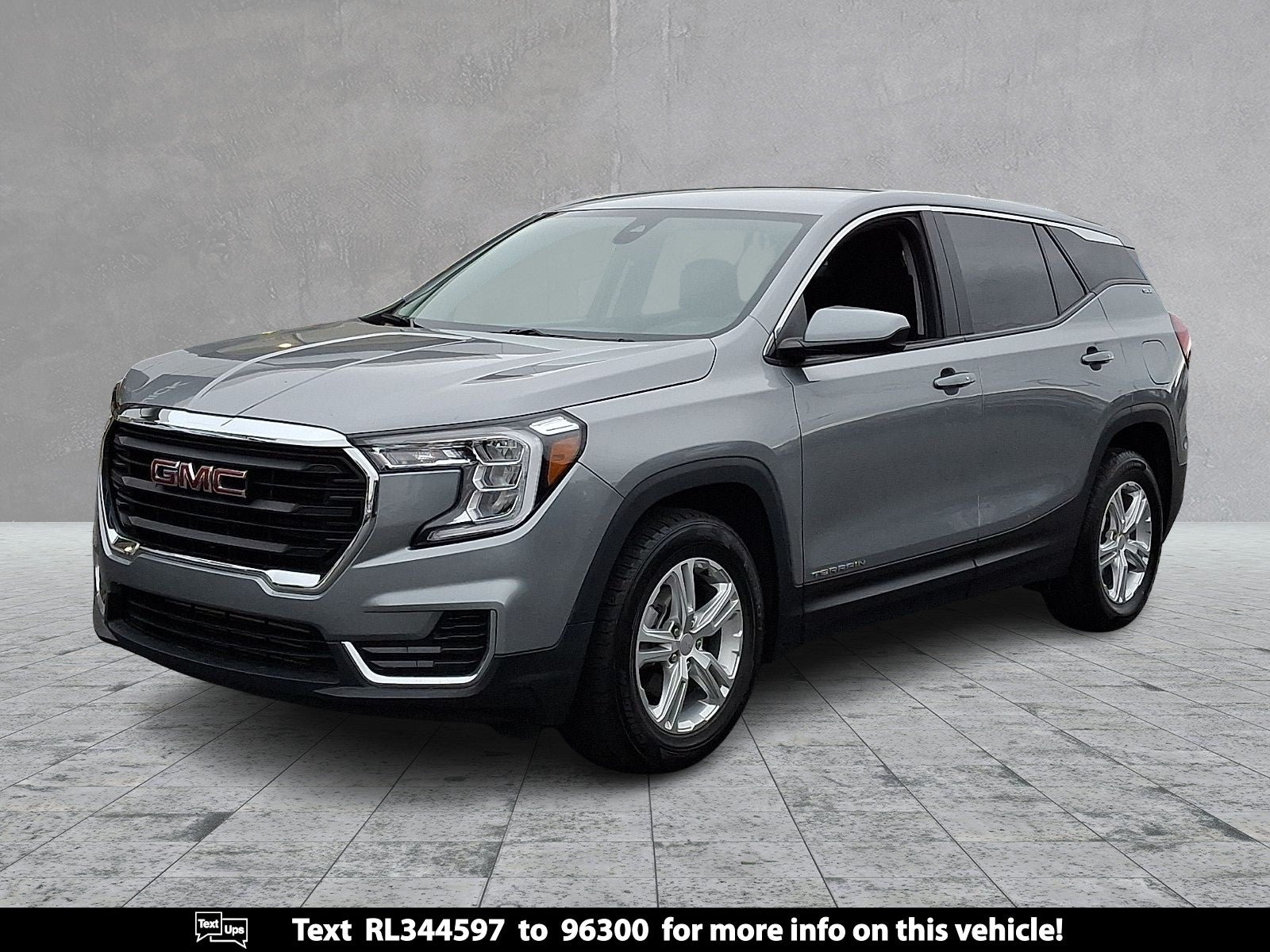 2024 GMC Terrain SLE in Sterling Metallic — front three-quarter view