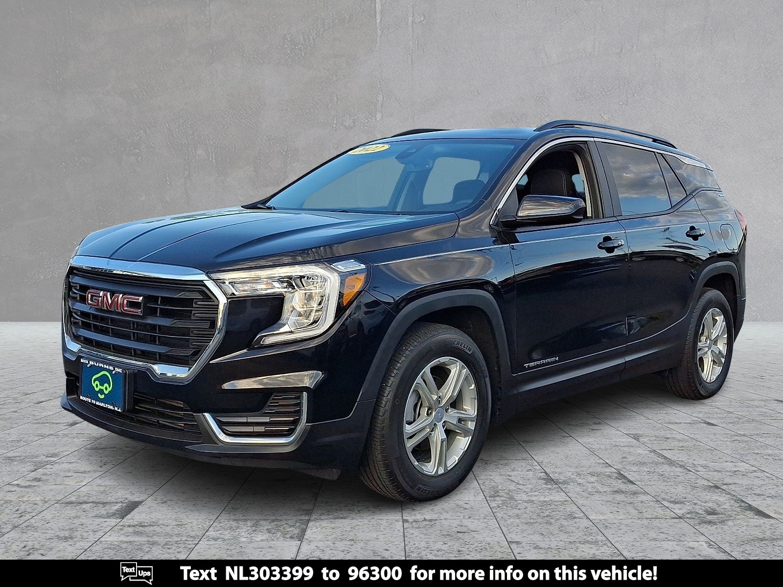 2022 GMC Terrain SLE in Ebony Twilight Metallic — front three-quarter view