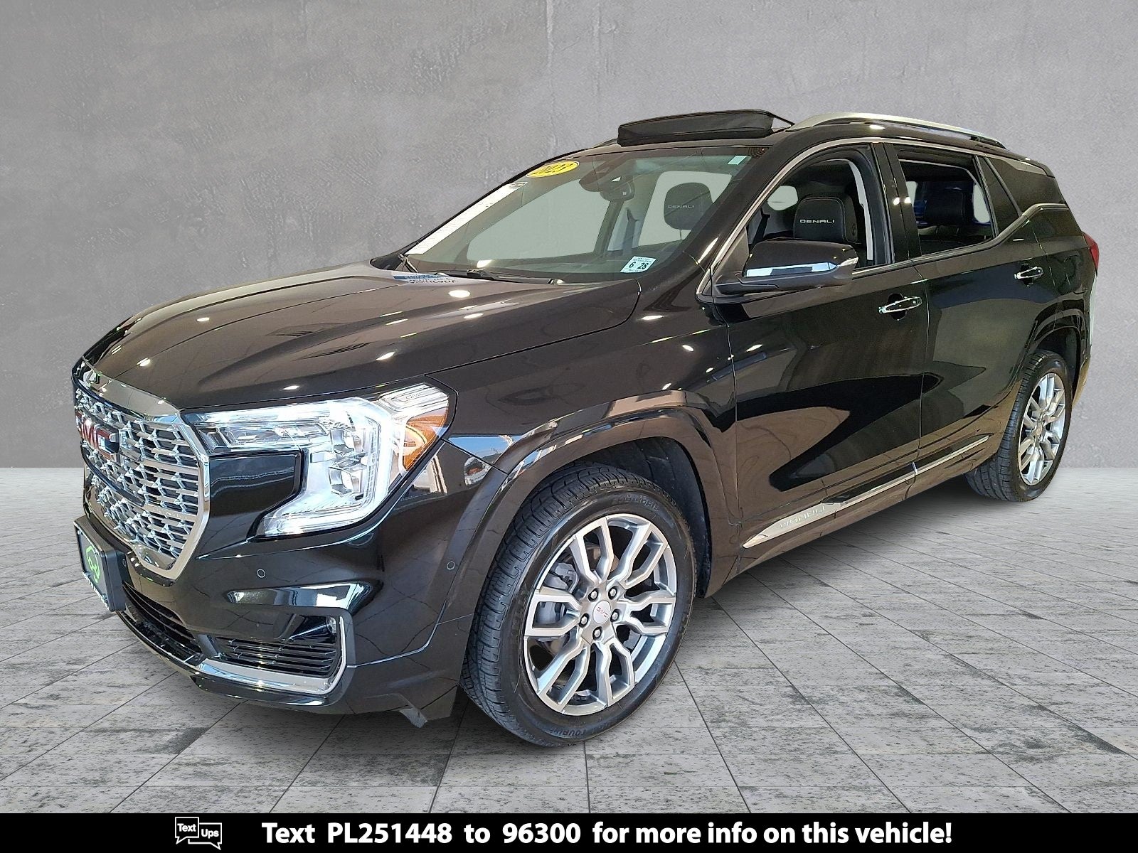 2023 GMC Terrain Denali in Ebony Twilight Metallic — front three-quarter view
