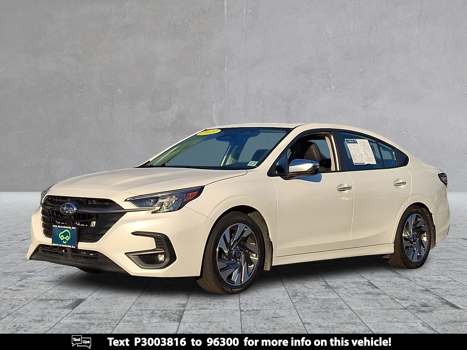 2023 Subaru Legacy Touring XT in White — front three-quarter view
