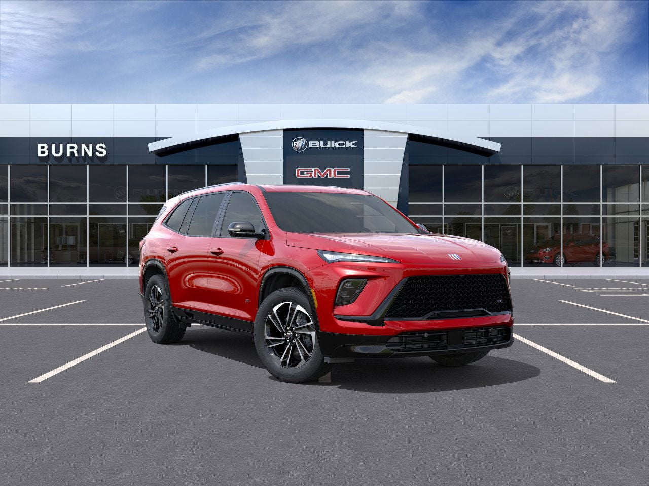2026 Buick Enclave Sport Touring in Cherry Red Tintcoat — front three-quarter view