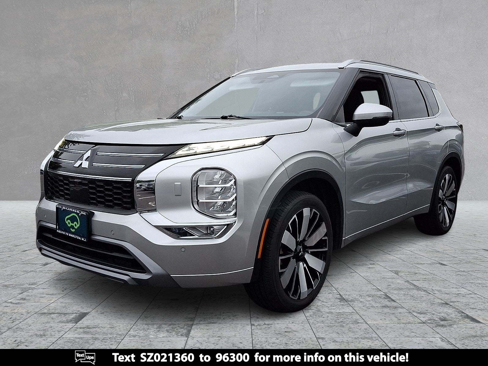 2025 Mitsubishi Outlander SEL in Silver — front three-quarter view