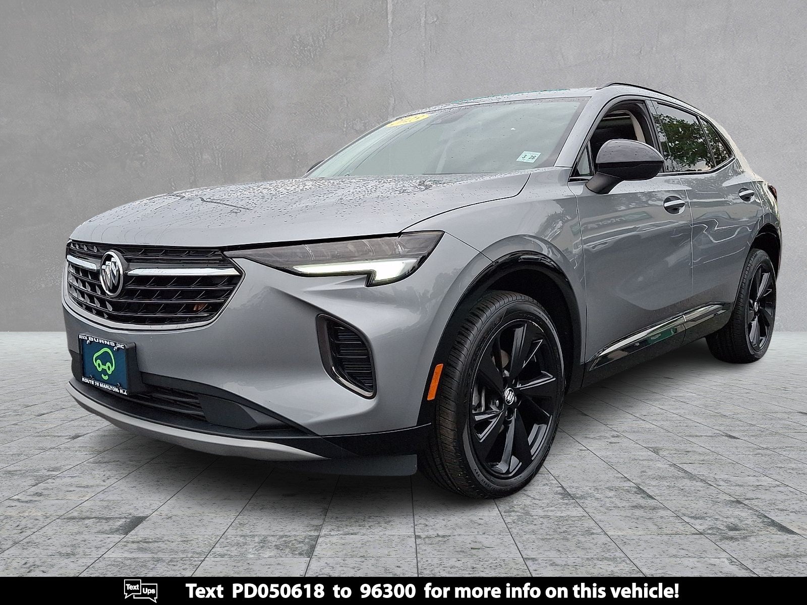 2023 Buick Envision Essence in Moonstone Gray Metallic — front three-quarter view